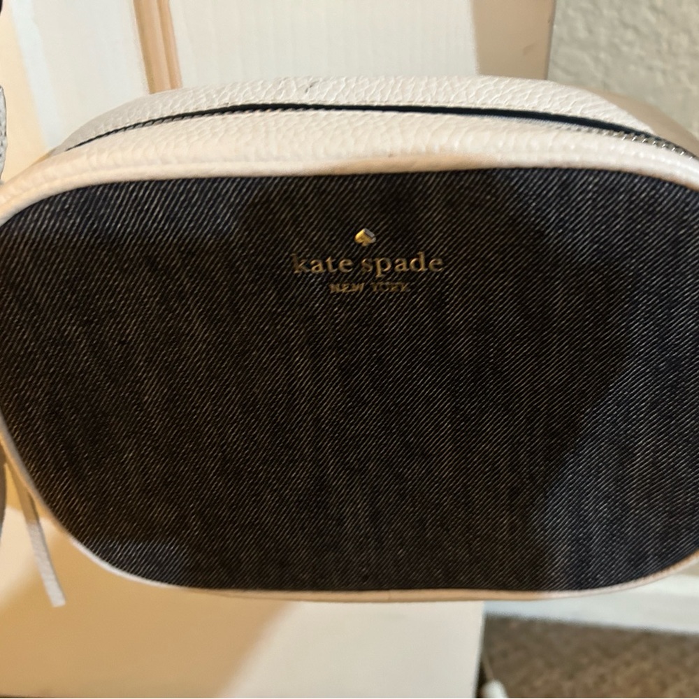 Kate Spade denim and white adjustable shoulder strap purse.